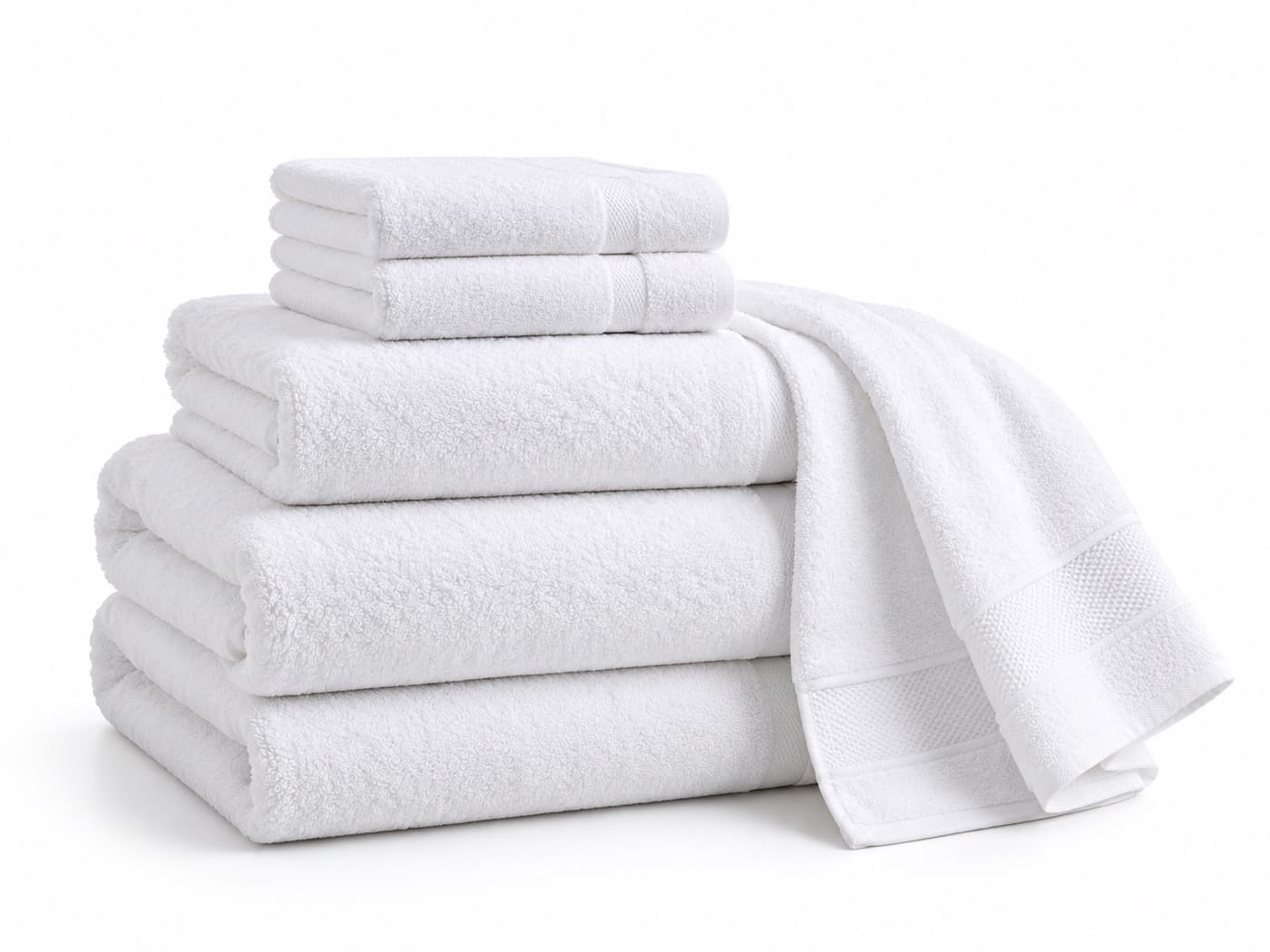 A six-piece white towel set in bath, hand and face sizes