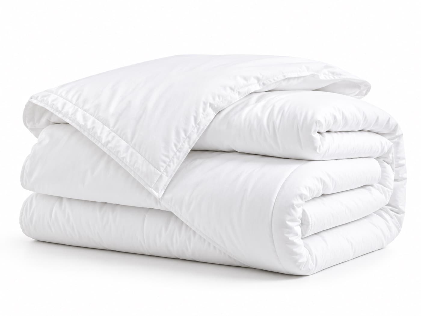 A folded white quilted duvet with fibre fill